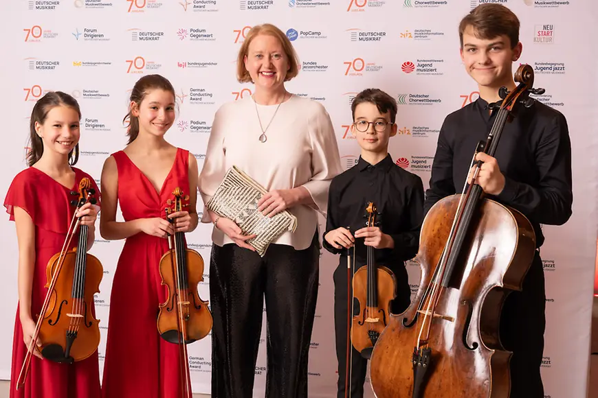 Bundesjugendministerin Lisa Paus mit dem Piaschowa Quartett.