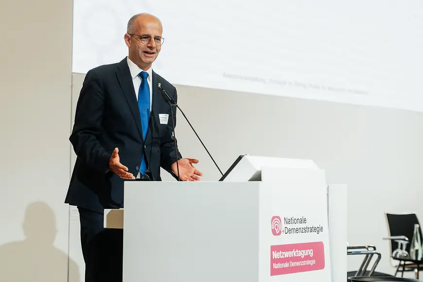 Michael Brand auf einem Podium 