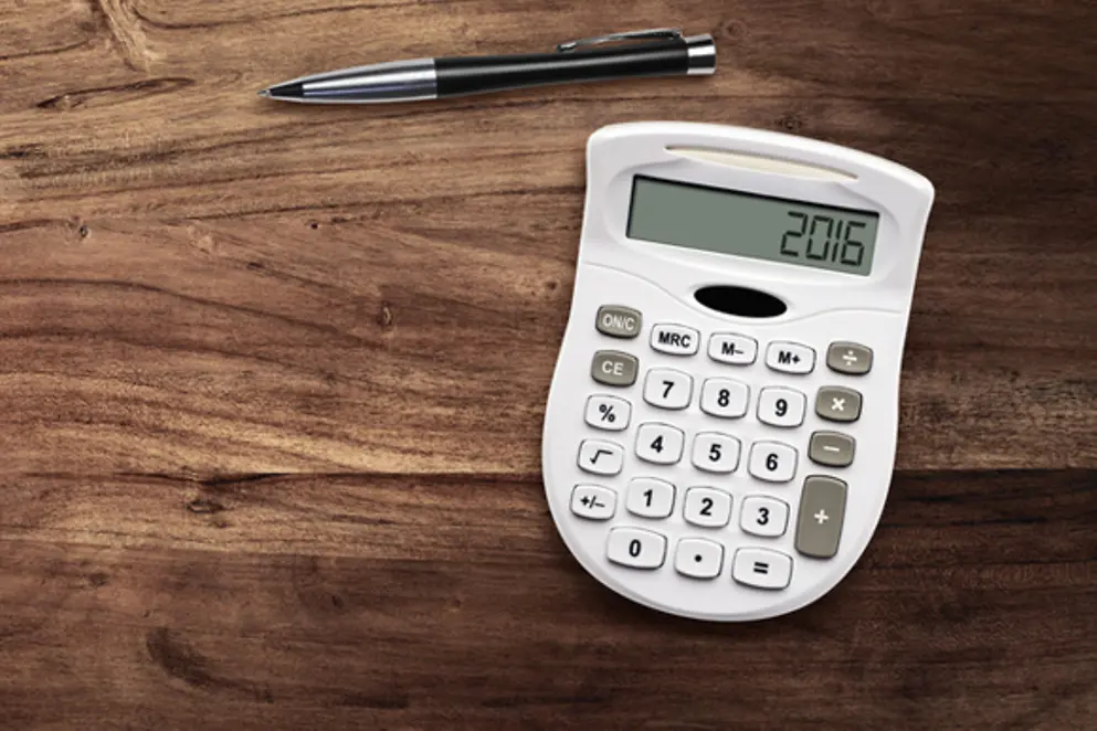 Taschenrechner und Kugelschreiber